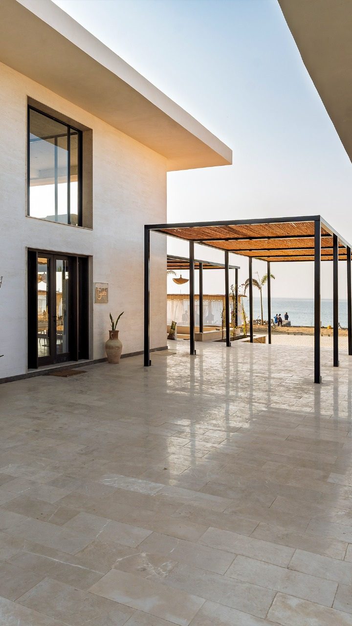 The seafront terrace and covered walkway at Khoj Allana